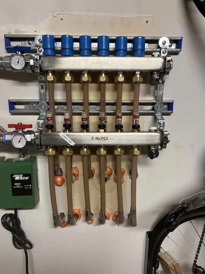 Plumber performing Water Heater Repair at a residential property in Lewisville